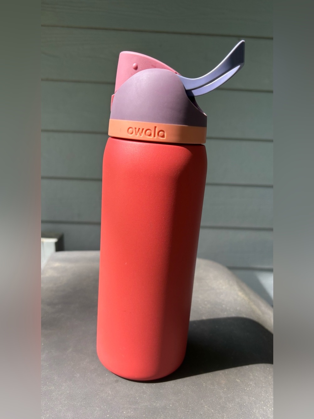 Owala 32 oz FreeSip Insulated Water Bottle in Red-Orange with Purple Accent Lid - Picture 2 of 4